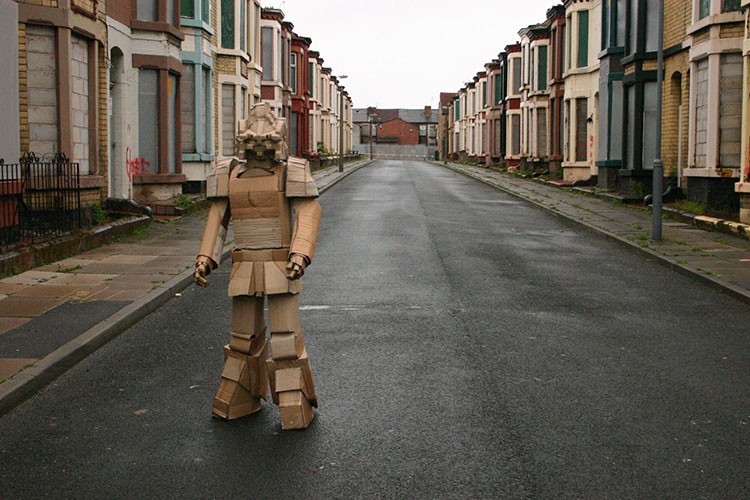 Cardboard Robot stood on a deserted street in Kensington, Liverppol